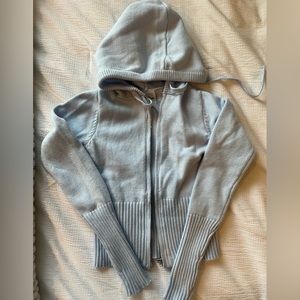 Isabelle’s cabinet knit baby blue zip up